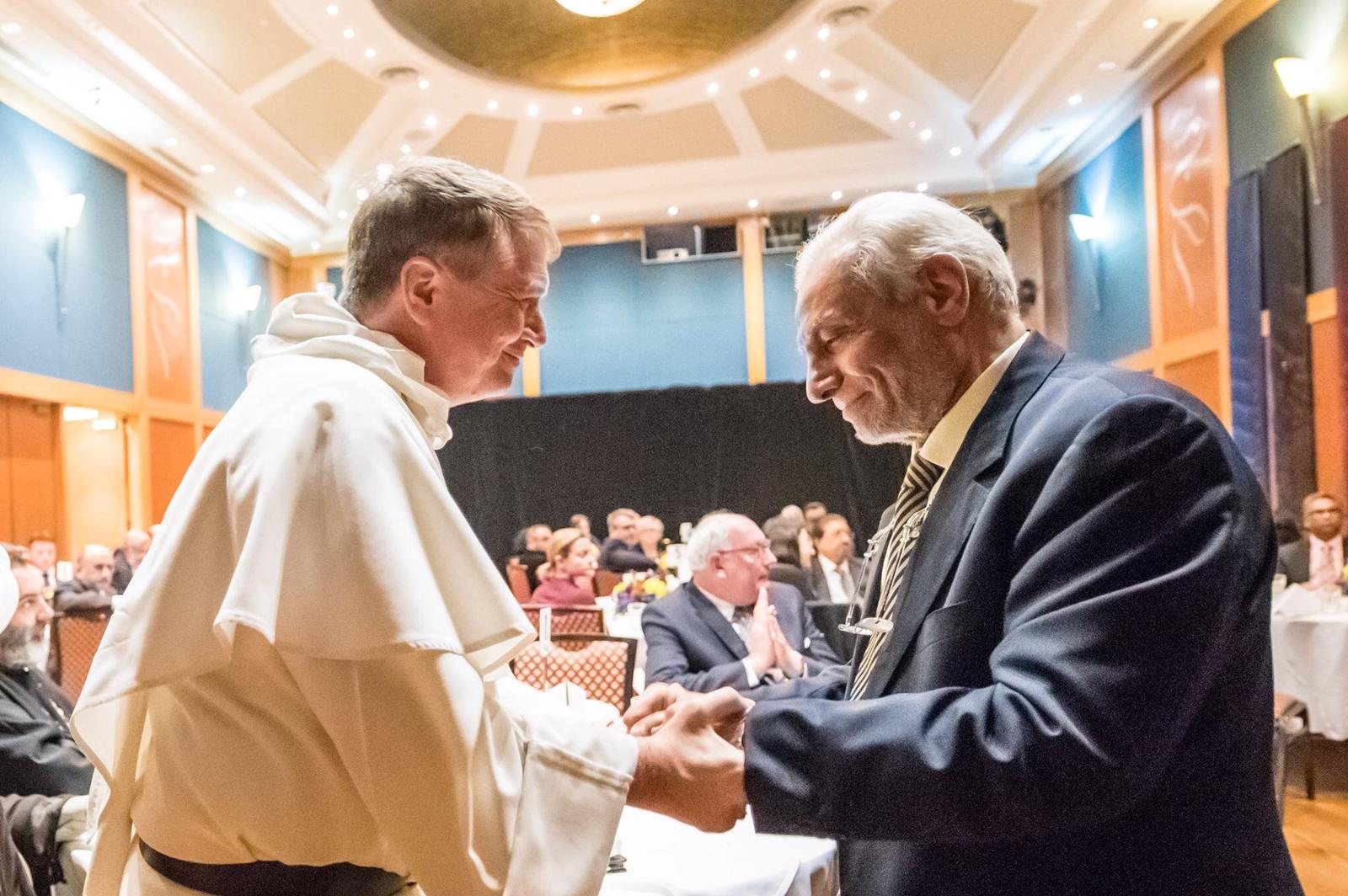 The Grand Mufti of Australia greeting a Christian leader